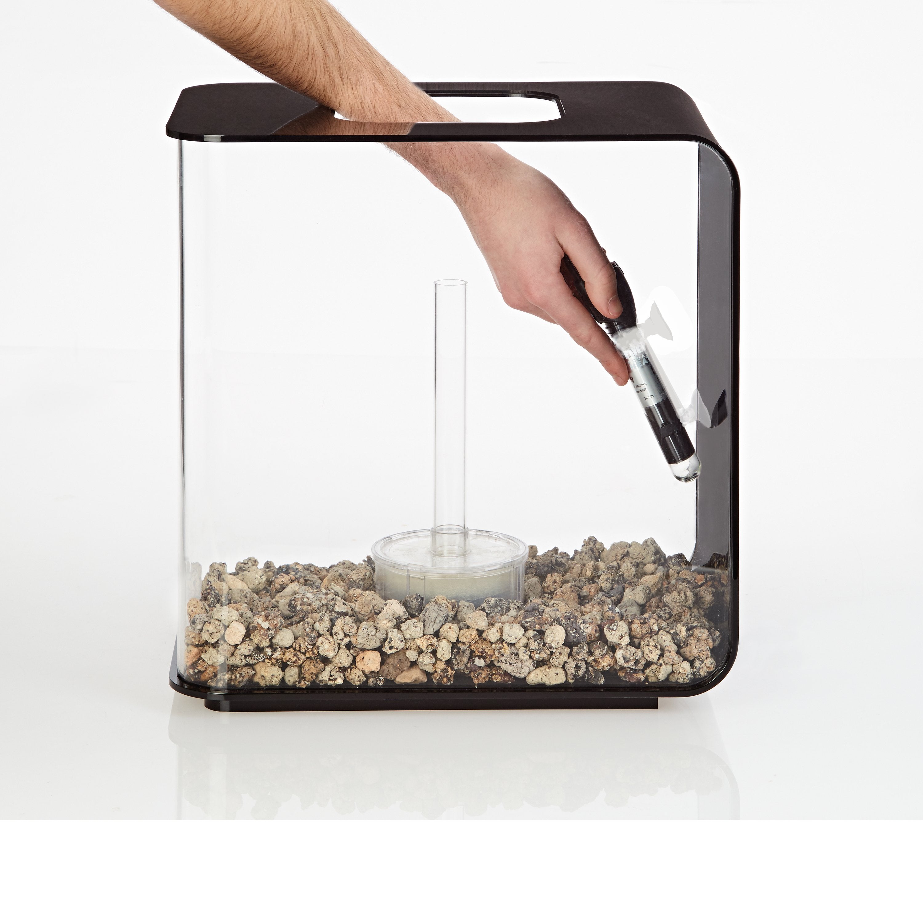Install the biOrb Aquarium Heater to the side of your aquarium